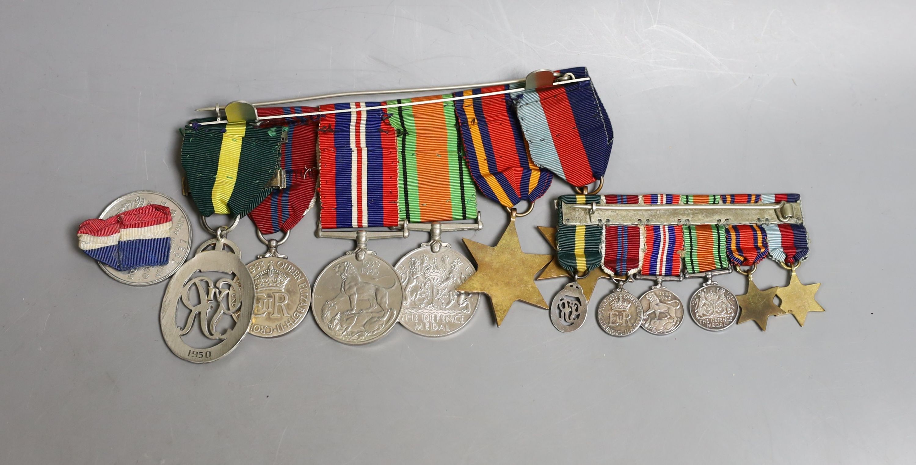 A WWII medal group of six, with miniatures, and a royal commemorative medal, 1937